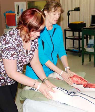 Archways students learn massage therapy and reflexology